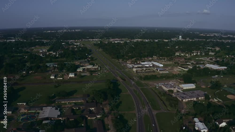 Aerial Drone Shot. Flying Over Highway, Cars, Buildings, and Trees. Aerial Drone Shot. Flying Over Highway, Cars, Buildings, and Trees.
