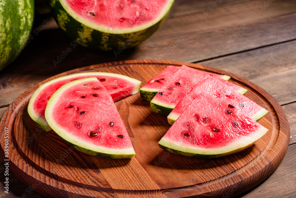 Fresh delicious watermelon sliced with mint and watermelon juice Fresh delicious watermelon sliced with mint and watermelon juice