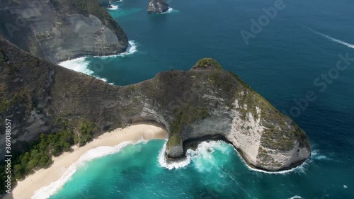 Aerial 4K lateral view of Keilingking beach in Nusa Penida island in Bali - Indonesia