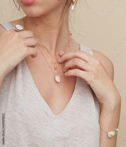 Woman wearing shell jewellery photo
