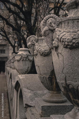 Ram decorated goblet statues cast in concrete