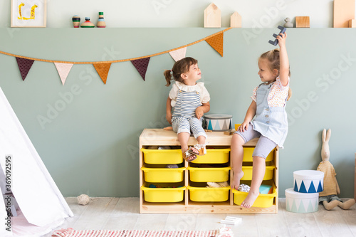 Little Girls Playing Guess Who photo