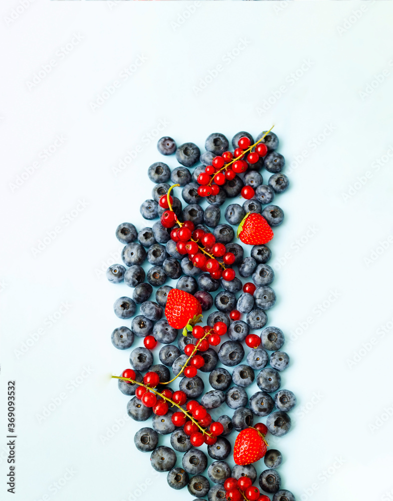 Conceptual food. Creative food background of fresh berries for design. Close-up Conceptual food. Creative food background of fresh berries for design. Close-up