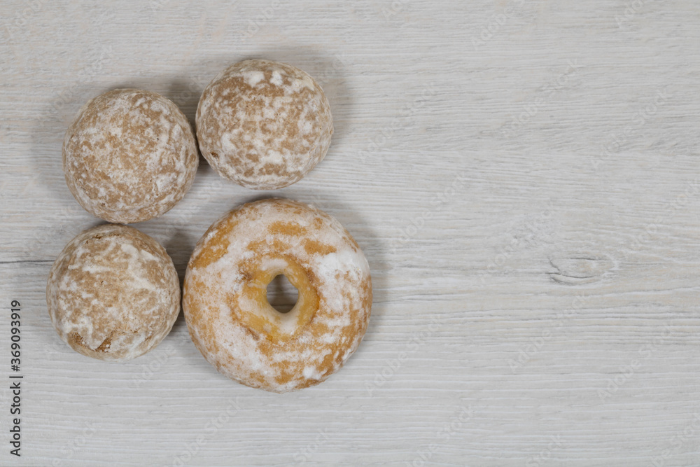 Sweet gingerbread cookies with donuts in sugar glaze. Sweet gingerbread cookies with donuts in sugar glaze.