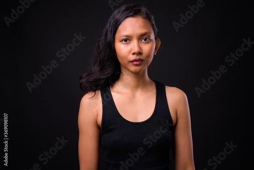 Portrait of young beautiful Asian woman with nose ring