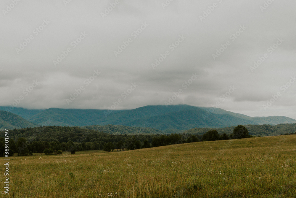 smoky mountain landscape with clouds