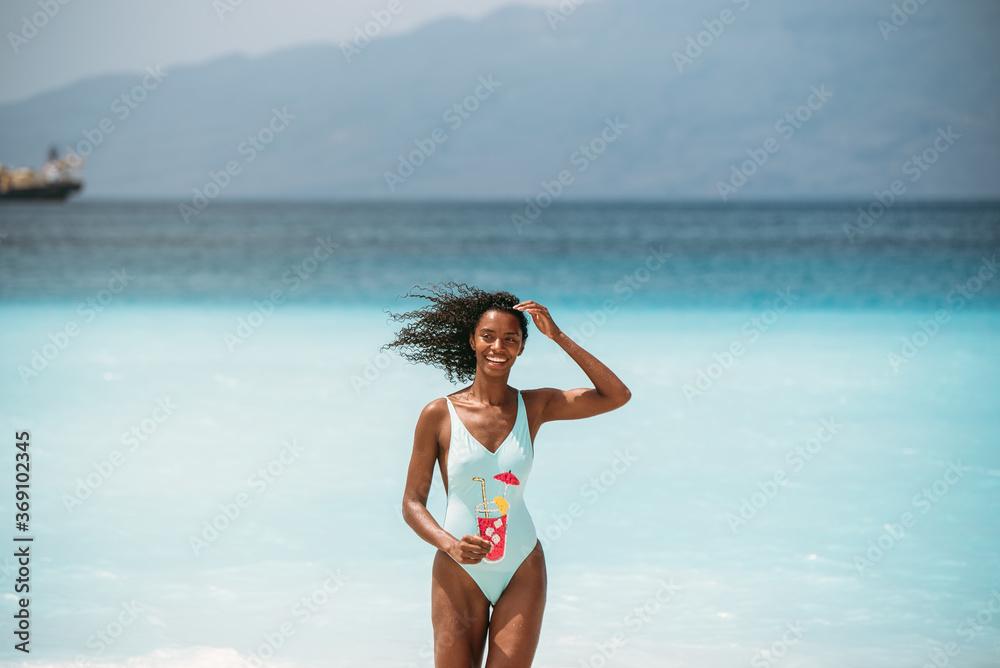Beautiful woman in a tropical beach island Beautiful woman in a tropical beach island