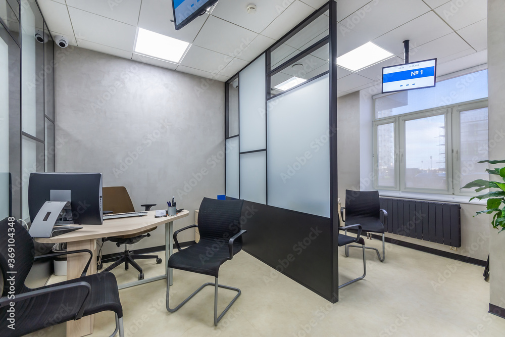 The modern cubicle office with glass panels, office furniture and digital  signages. Workplace in the modern sales office Stock-Foto | Adobe Stock
