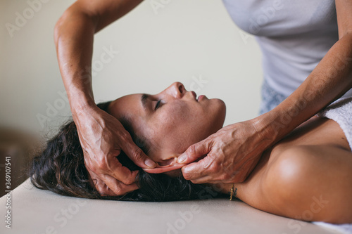 Woman having facial massage