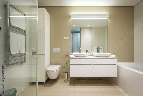 Interior of stylish bathroom with toilet bowl