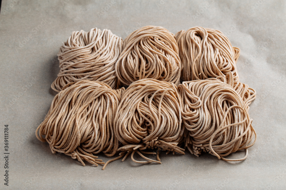 Nests of homemade raw buckwheat noodles Nests of homemade raw buckwheat noodles