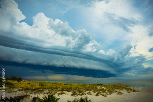 Imposing and dramatic storm clouds above a beach on Florida's Gulf Coast