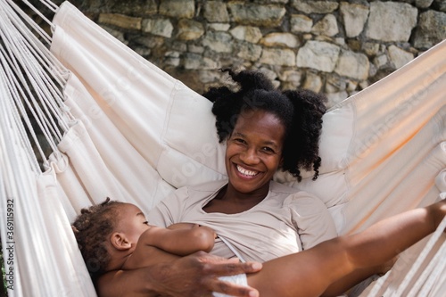 mother nursing her toddler