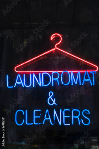 Laundromat and Cleaners sign photo