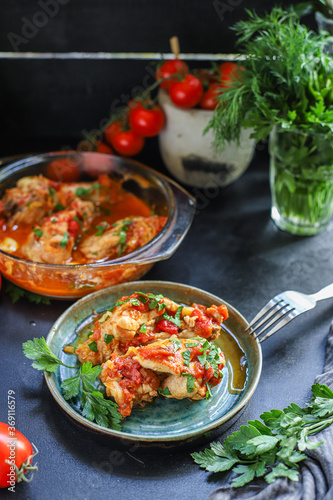 chicken meat tomato sauce chakhokhbili piece of vegetables chunk fried chashushuli second course food background top view copy space for text eating healthy