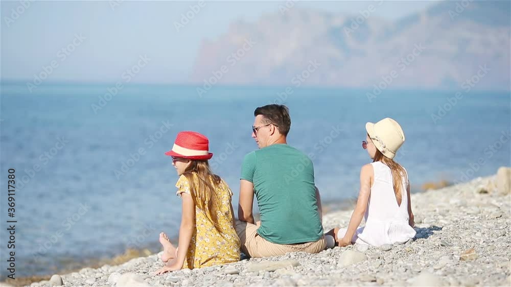 Happy beautiful family on a tropical beach vacation Happy beautiful family on a tropical beach vacation