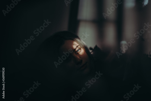 Portrait of woman relaxing on a couch