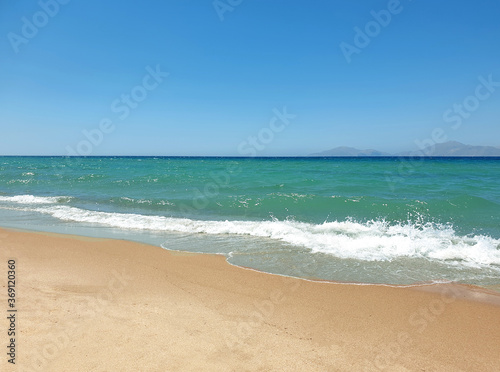 Blue sea and beach background. Aqua sea water surface. Sea surface view. Beach view.