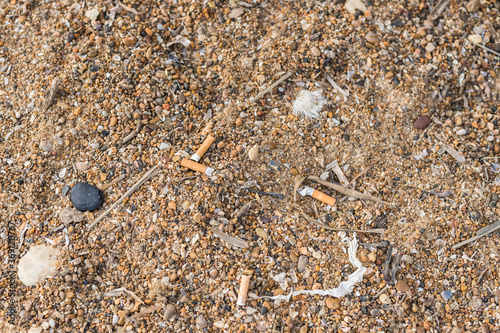 Cigarettes on the beach photo