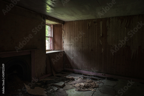 Light through window of abandoned house