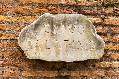 An ancient tablet of ancient times on on which in Latin is written Clivo Palatino - the name of the ancient road in Rome to the Palatine Hill. close-up