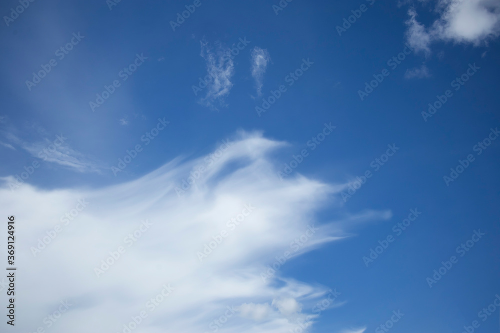Altostratus clouds against a blue sky. Altostratus clouds against a blue sky.