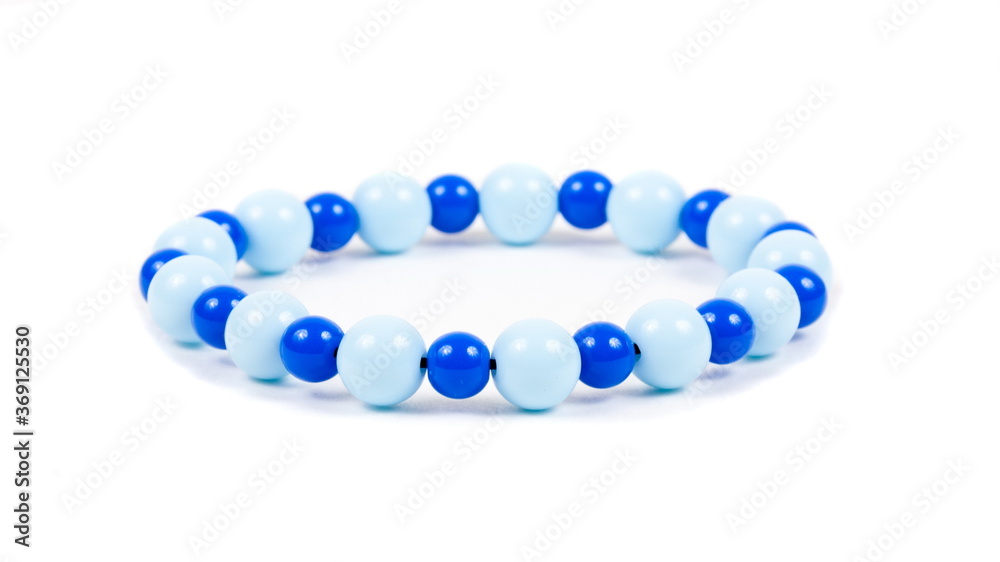 Beaded bracelet on the white surface