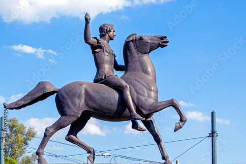 the equestrian statue  of Alexander the great. Its located in central Athens. Greece. Sunny day with blue sky