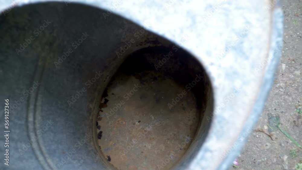 The top view of the watering can with empty inside The top view of the watering can with empty inside