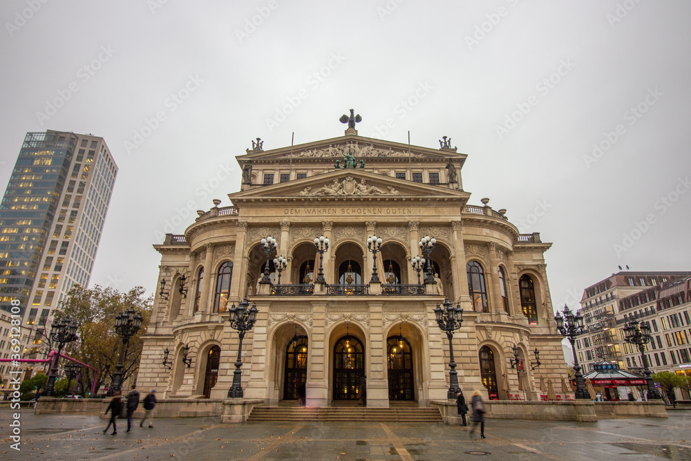 Frontal view of the old opera building at a rainy and cloudy day in Frankfurt, Germany