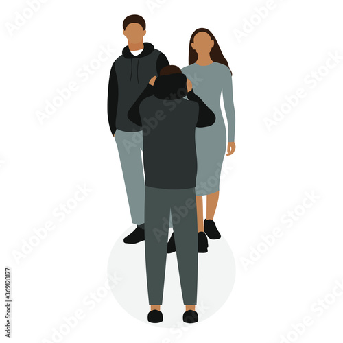 Male character puts a hood on his head in front of other people