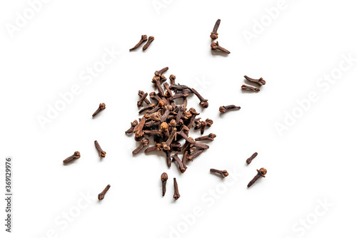 top view of a pile of organic cloves isolated on a white background
 photo