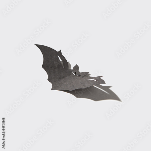 Handcraft black bat with shadows. photo