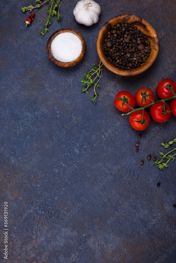 Tomatoes, thyme, garlic and spices Tomatoes, thyme, garlic and spices