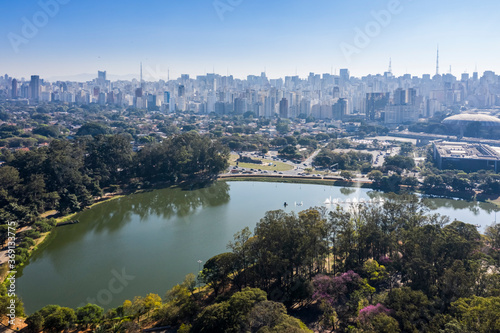 lake in Ibirapuera Park with buildings in the background in São Paulo, Brazil