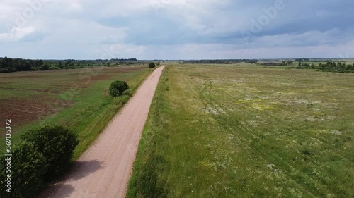 Dirt road in the endless fields of Russia