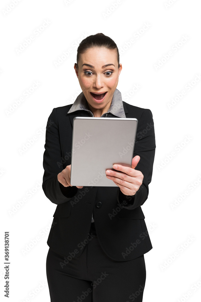 Amazed woman using her tablet Amazed woman using her tablet