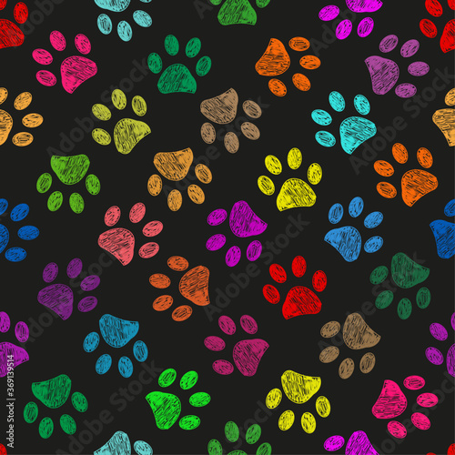 Colorful vibrant colored doodle paw prints. Seamless pattern for textile design. Paw prints background