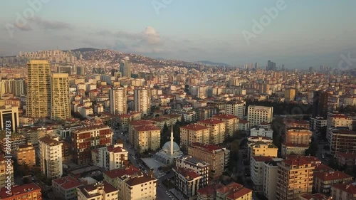 Aerial over Istanbul Suburbs. Over dense residential area with many buildings. Istanbul, the most populous city in Turkey. Metropolitan housing and suburban architecture
 photo