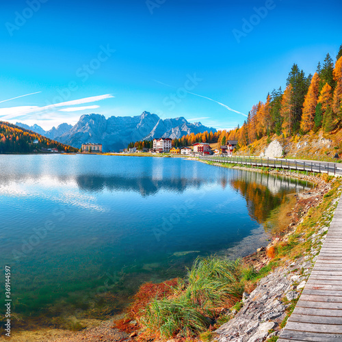 Fototapeta Naklejka Na Ścianę i Meble -  Majestic sunny view of famous Misurina lake during autumn period