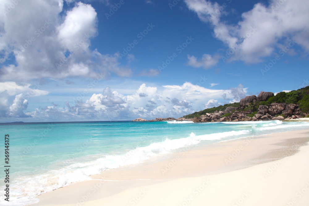 Heavenly beach in paradiase in Seychelles islands, turquoise water sea, white sand beach, granit rocks and green vegetation. Heavenly beach in paradiase in Seychelles islands, turquoise water sea, white sand beach, granit rocks and green vegetation.
