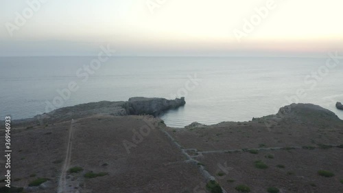 Aerial View Of Beautiful Wide Rocky Shore After Sunset