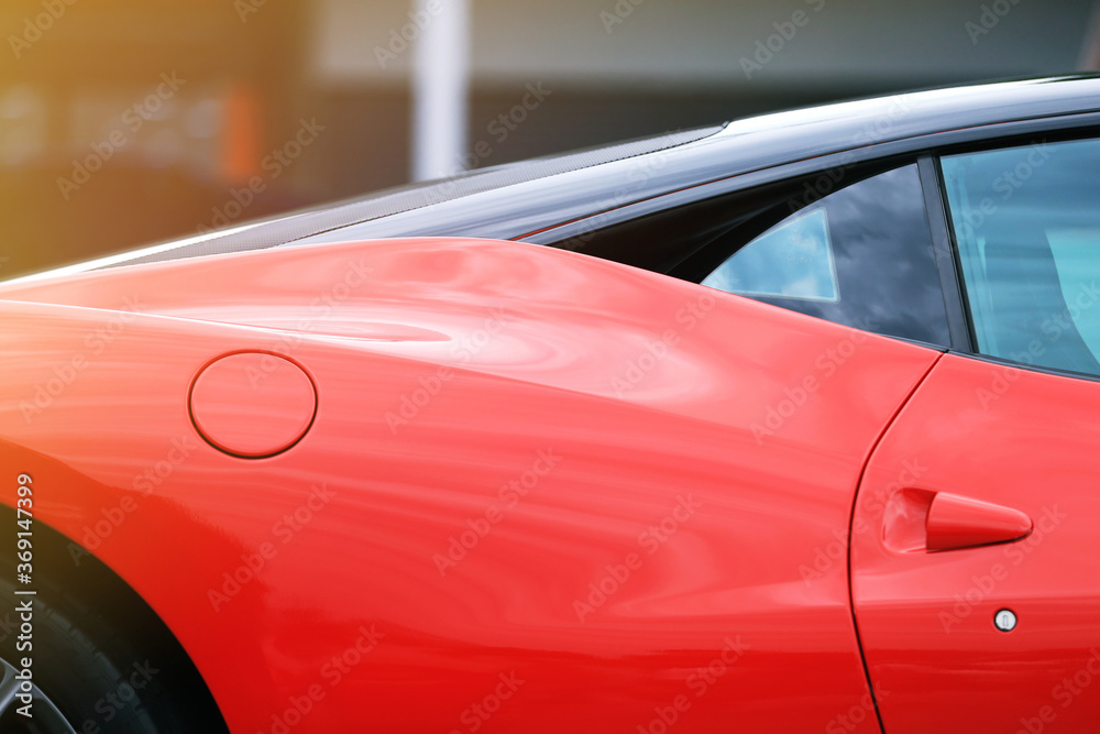 Close up of red sports car Close up of red sports car