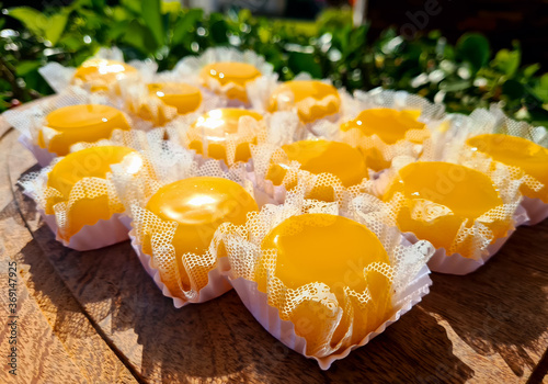 Quindim is a sweet with the ingredients of egg yolk, sugar and grated coconut. They are delicious and perfect for a beautiful dessert. photo