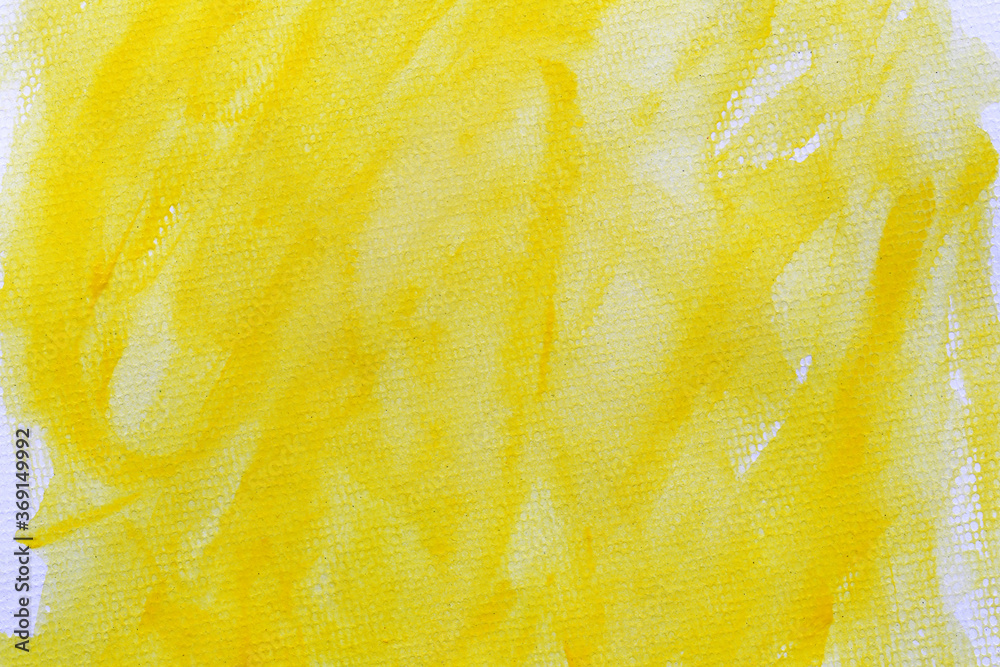 Yellow watercolor on art paper background.