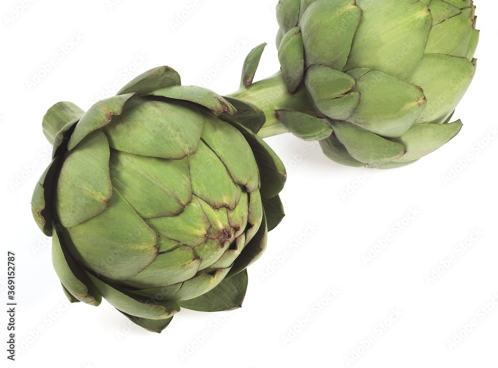 Obraz premium ARTICHOKES AGAINST WHITE BACKGROUND