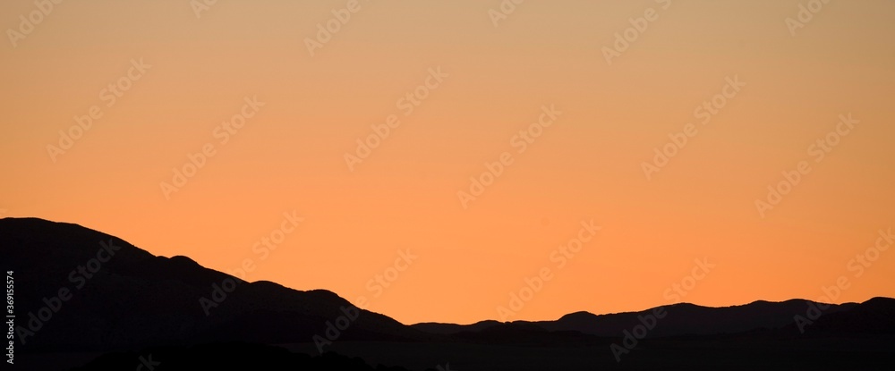 SUNSET IN NAMIB-NAUKLUFT PARK IN NAMIBIA