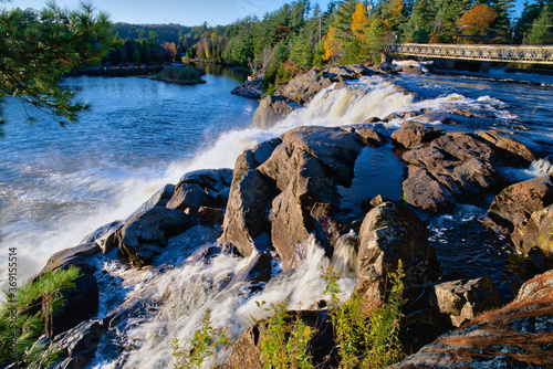 Waterfall in autumn forest at High Fall Park, Bracebridge, Ontario, Canada