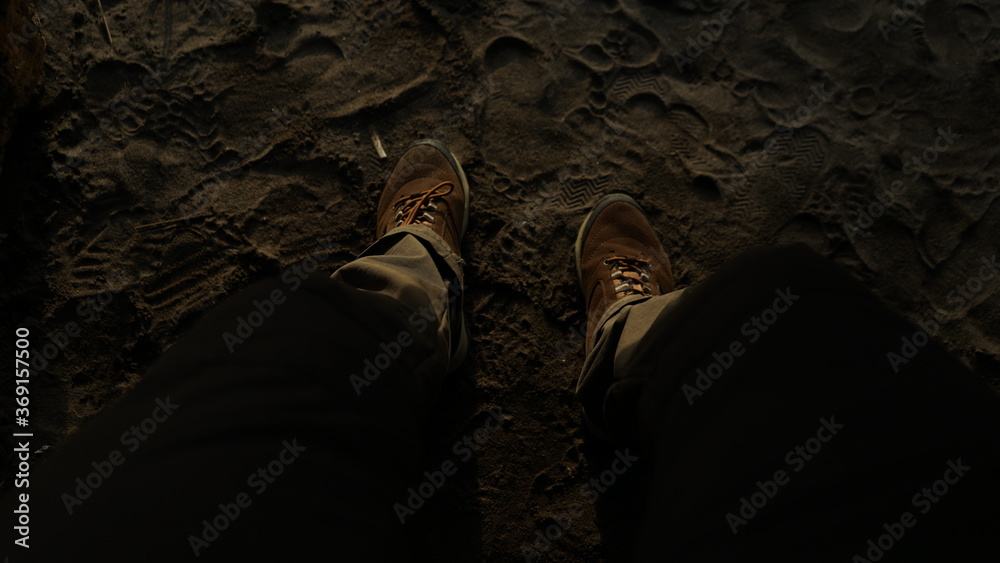 Brown shoes on the sand beach