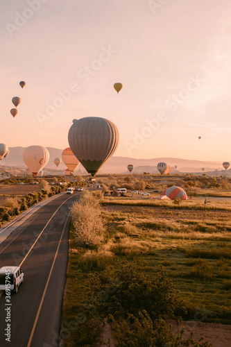 Fotografie Hot air balloon rides in Cappadocia at sunrise